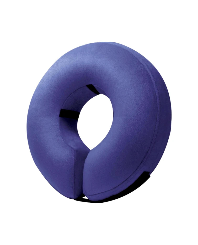 a blue pillow with a hole in the middle