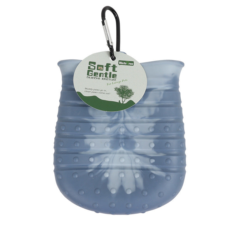 a blue water bottle with a tag with text: 'Soft Histo Gentle SILICONE BRISTLES For Larege Pets Muddy paws go in, paws'