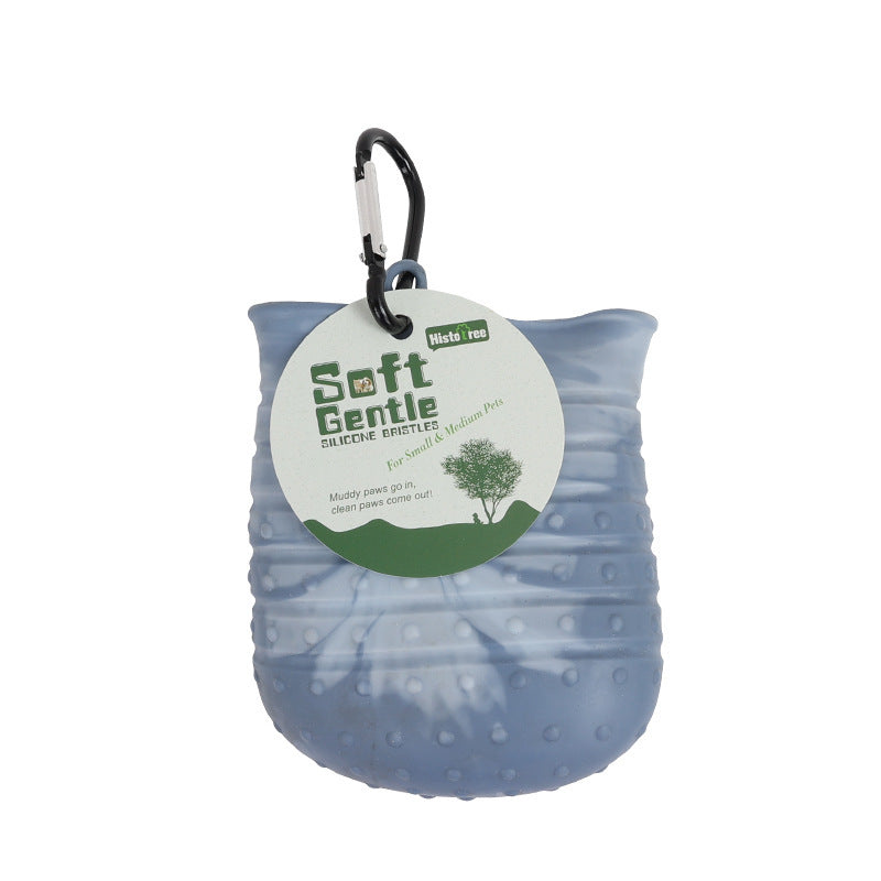 a blue bag with a tag with text: 'Histo Gentle SILICONE BRISTLES For Small & Medium Muddy paws go in, clean paws come'